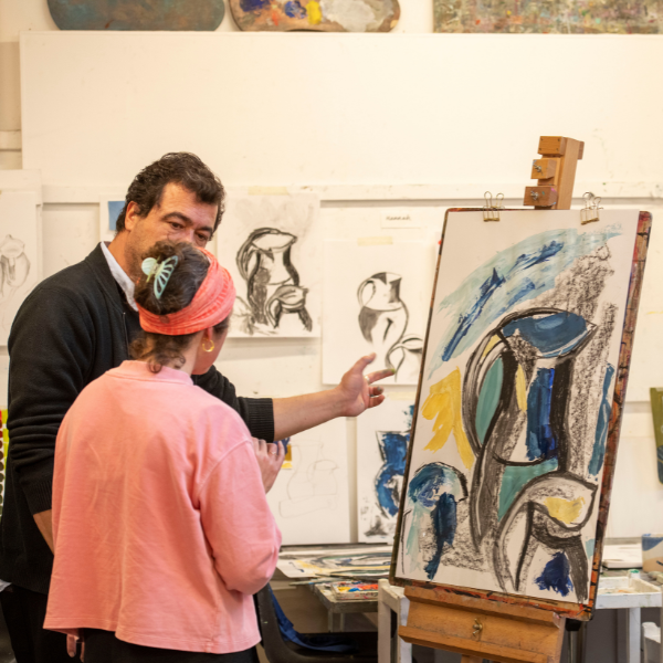 artist tutor and student during an artist development course