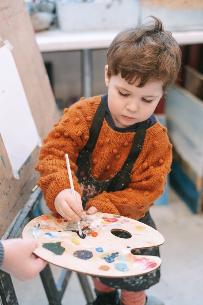 Sunday Kids Club child painting