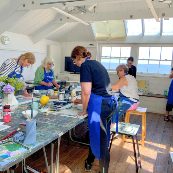 students working in the studio at st ives school of painting during a short art workshop