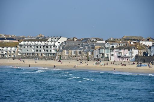 Porthmeor beach looking at Porthmeor studios home of St Ives School of Painting.